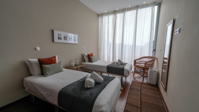 Twin room, the wicker chair