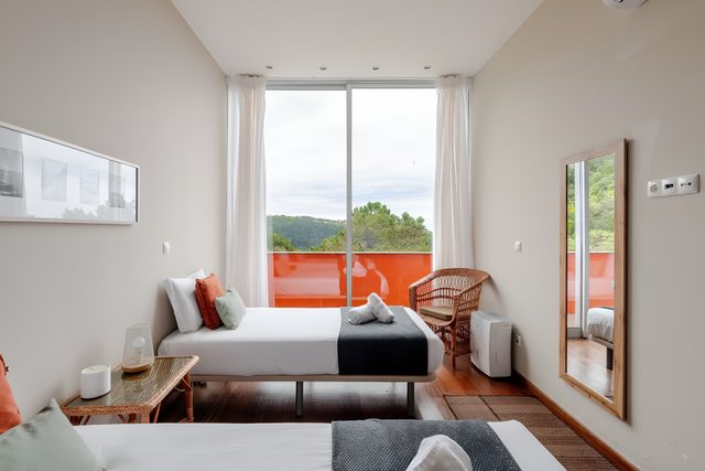 Twin room, window to the hills