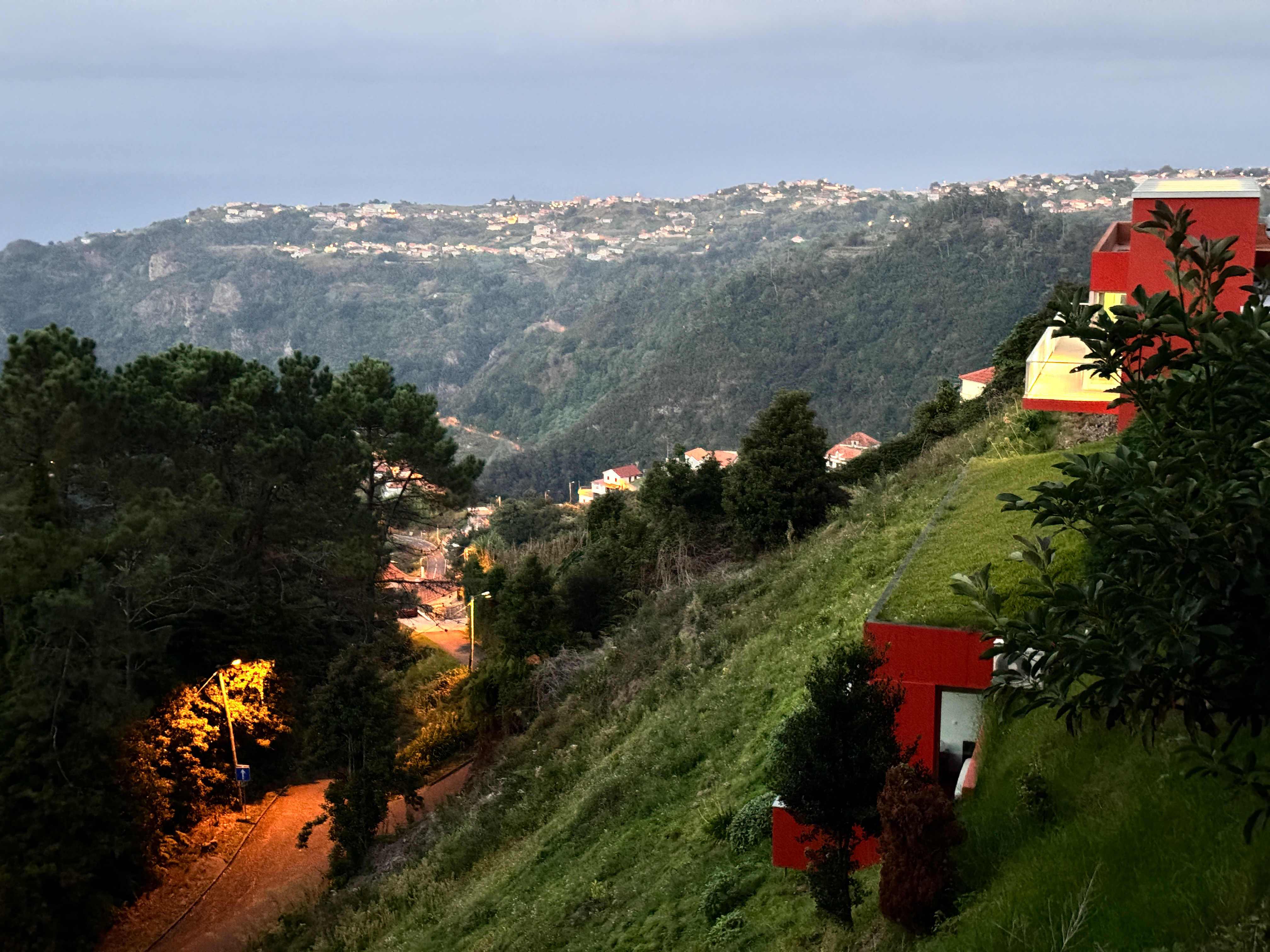 Looking down the hillside from the house at dusk